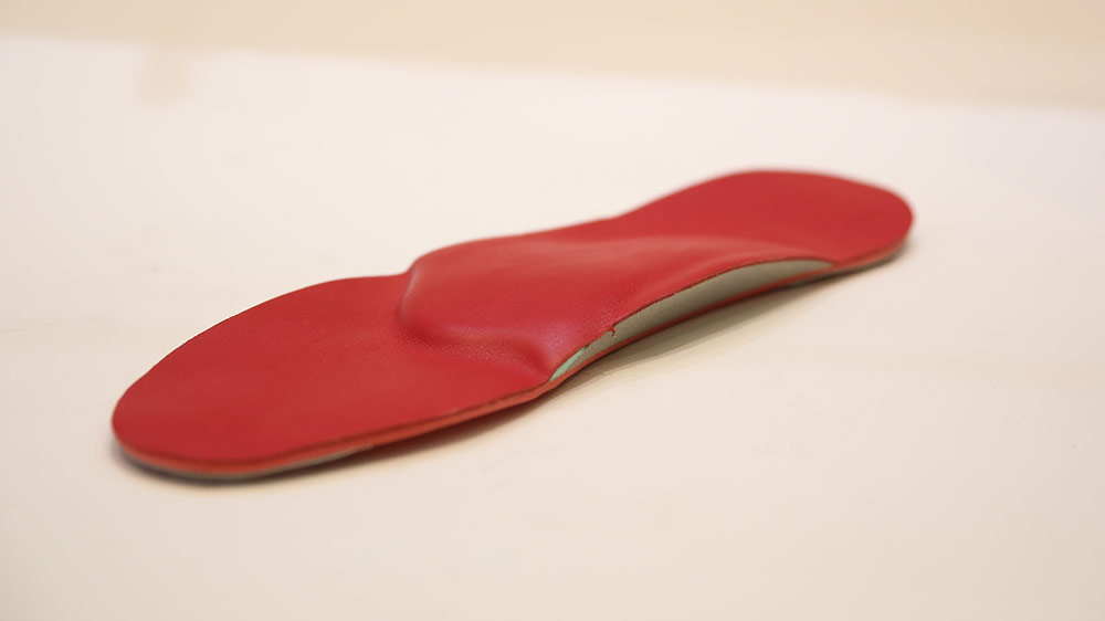 Bespoke Orthotic Mid Arch Support Red Covering